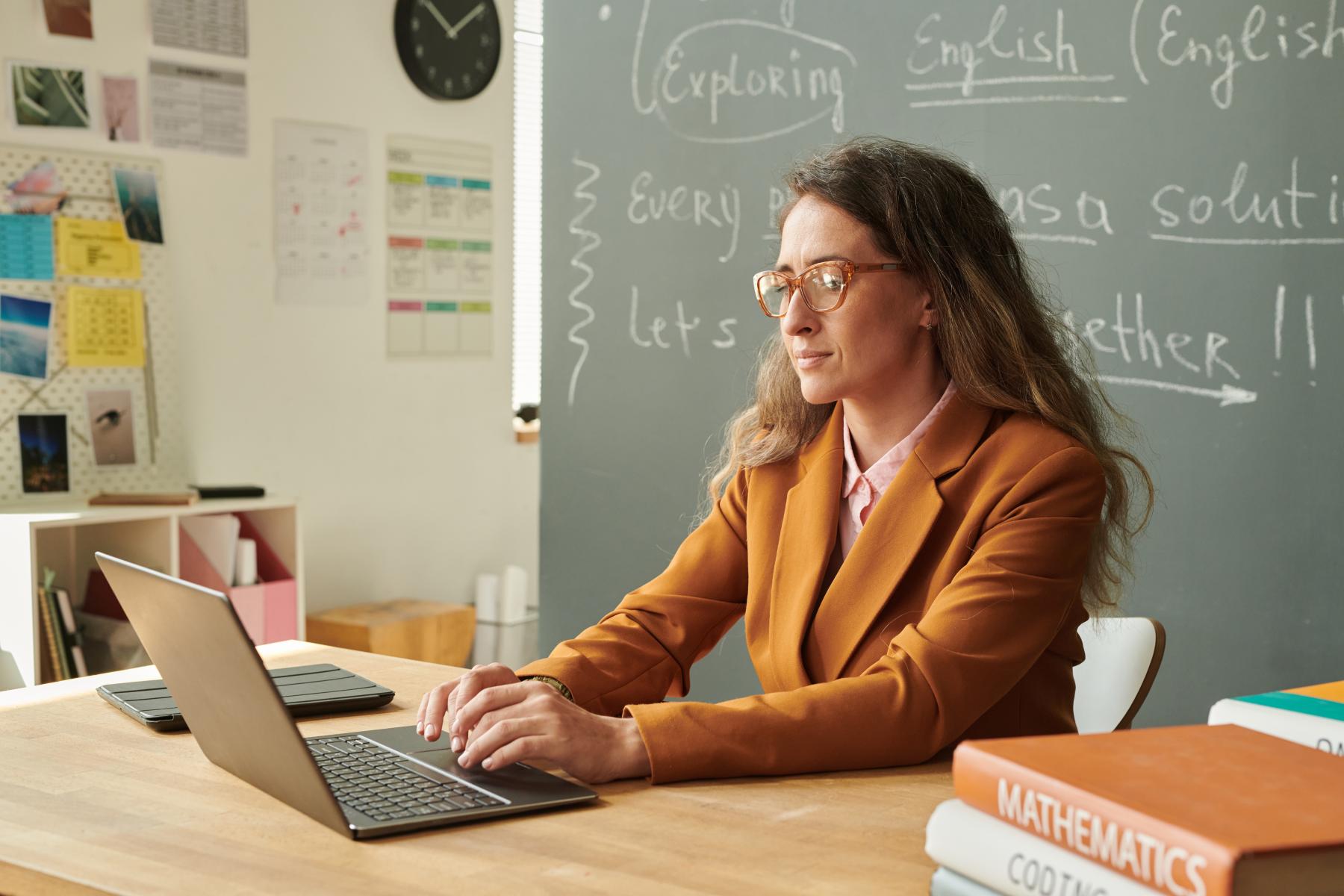 Teacher at her desk.